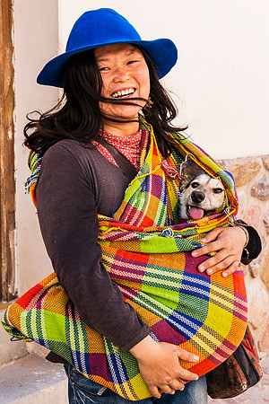 Dog and Chinese woman in Humahuaca, Juyjuy