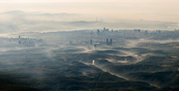 Istanbul: A misty, atmospheric cityscape of Istanbul, where the architecture fades into the morning light