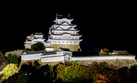 Himeji: The illuminated Himeji Castle stands majestically against the dark night sky in Japan