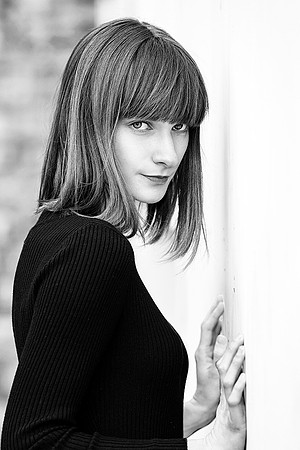 High-contrast monochrome profile portrait of Dovile, fine art photography
