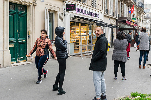 Keeping distance  in front of a bakery in Paris during the Corona Virus Lockdown � Ludo Segers @ The Lithuania Tribune
